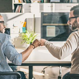 Two teammates working together